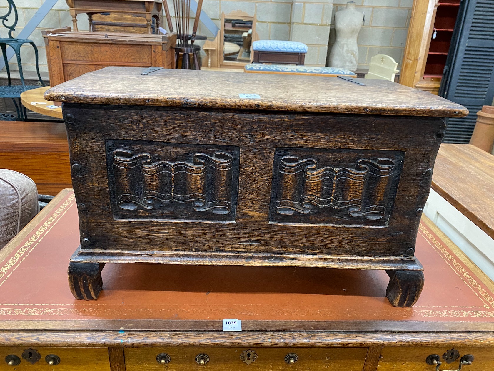 A small 1920's linenfold carved coffer, width 81cm